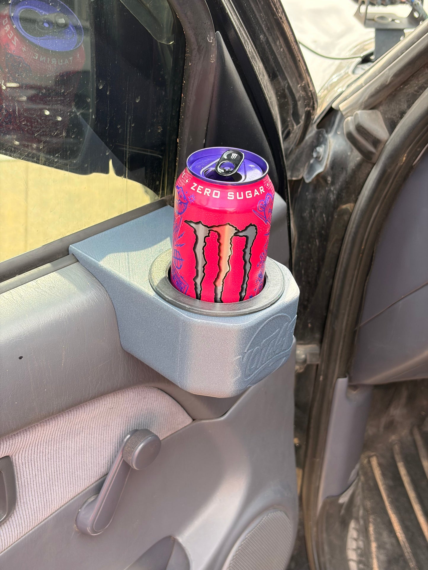 Door mounted Cupholder